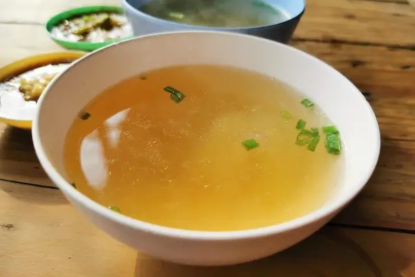 Is Panera Mexican Corn Chowder Vegetarian? bowl full of broth